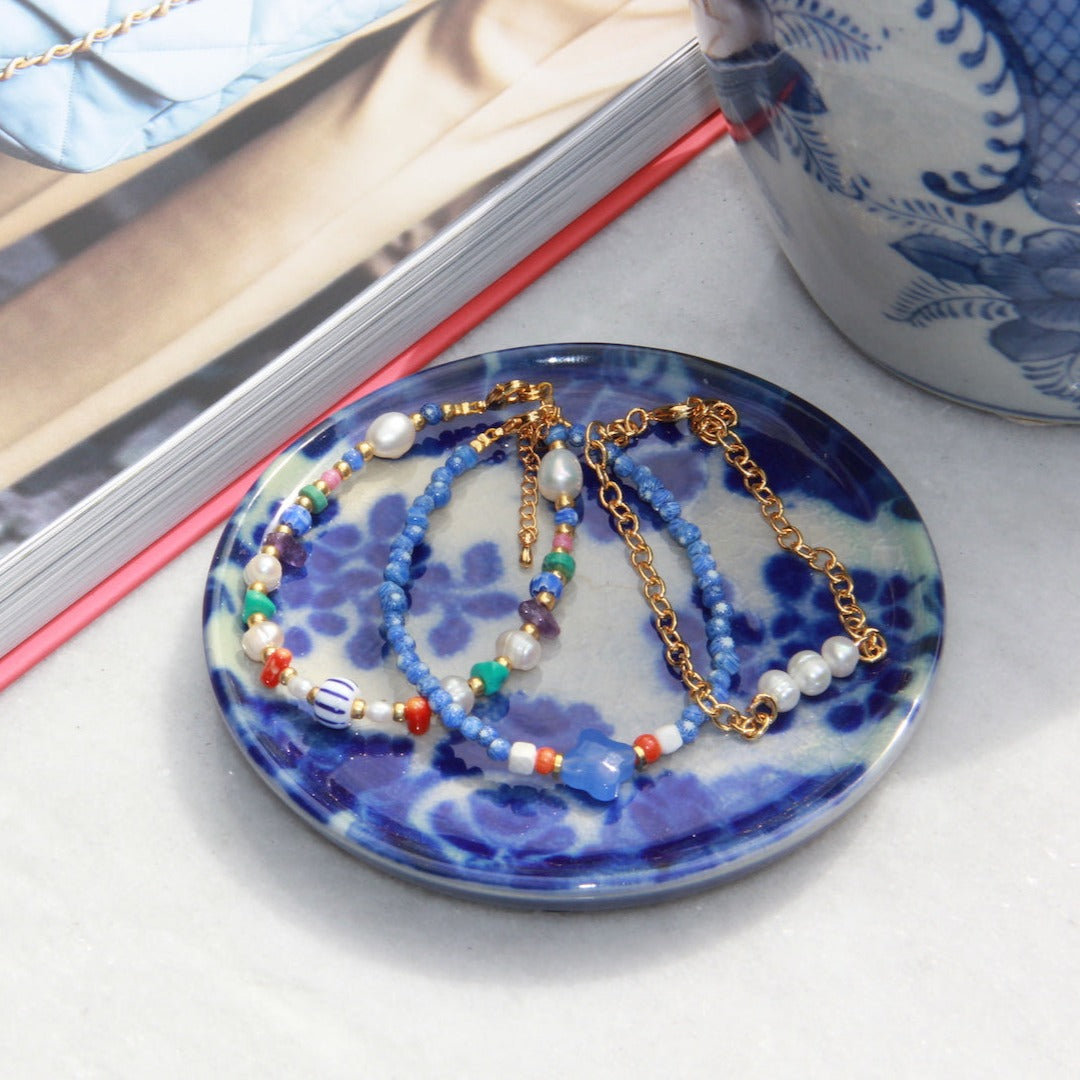 Parelarmband multi color met edelstenen met parelarmband met schakels en blauwe kralenarmband met jade