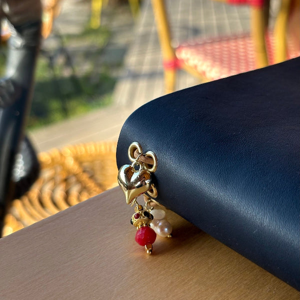 Notebook A5 met goudvergulde bedels in donkerblauw met details van bedels