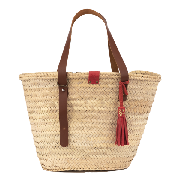 Handgemaakte rieten tas uit de Sevilla collectie met verstelbare leren hengsels en een rode leren kwast