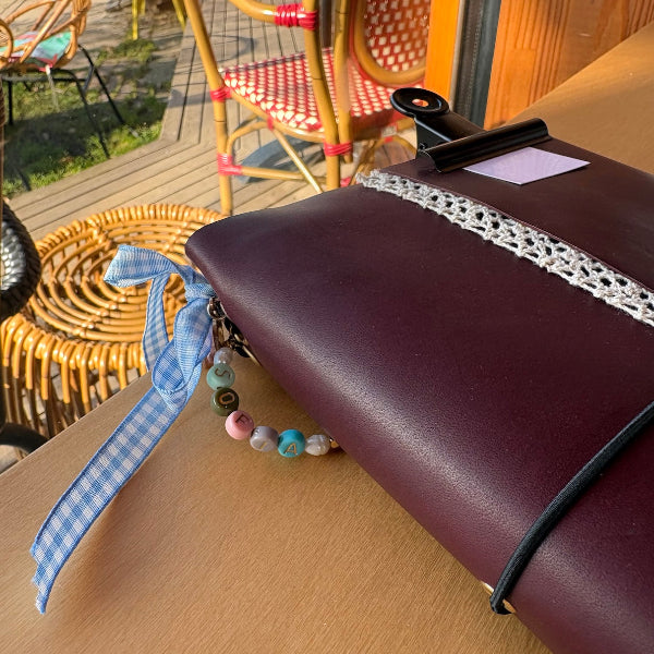 Workshop leren notebook voorbeeld notebook met bedels in bordeaux