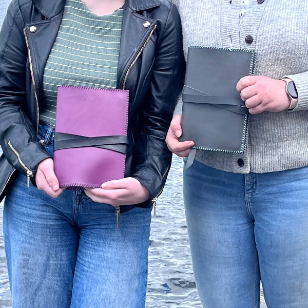 Eindresultaten uit workshop leren notebook in lila en grij